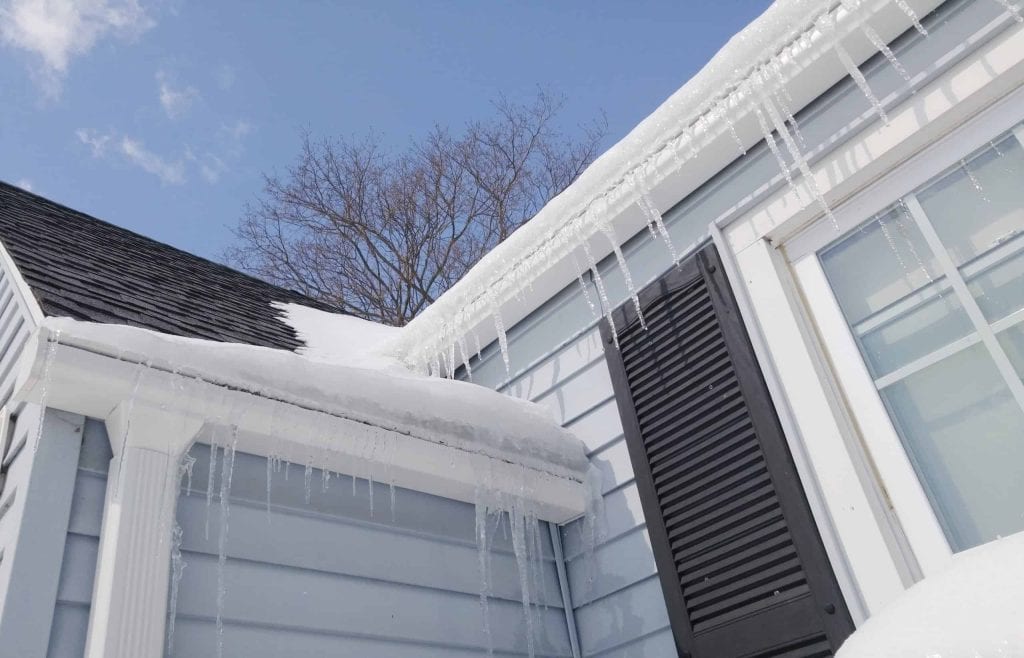 Ice damns on a roof in calgary