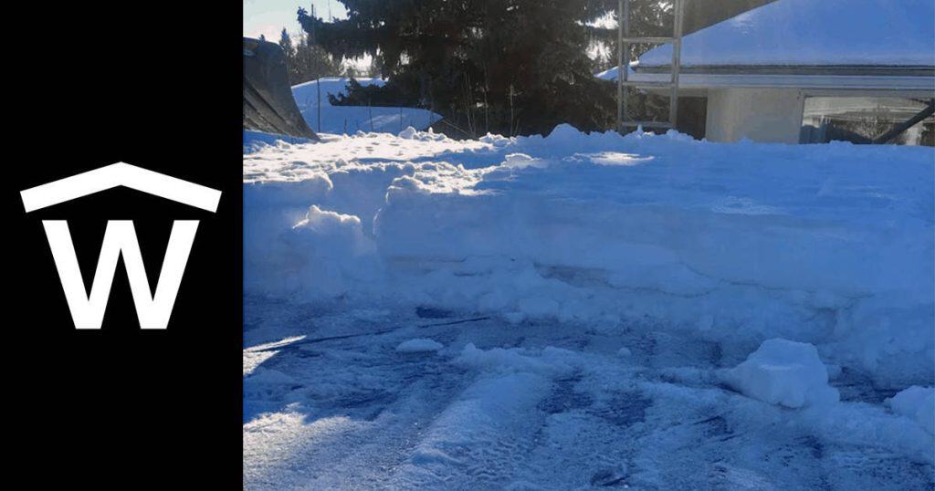 Snow Removal on a flat roof in calgary