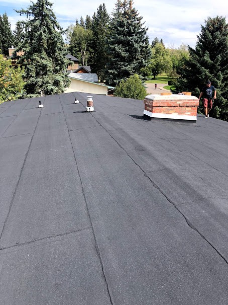 Calgary Roofing Flat Pitched Roof