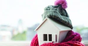 a small wooden roof that is winter ready