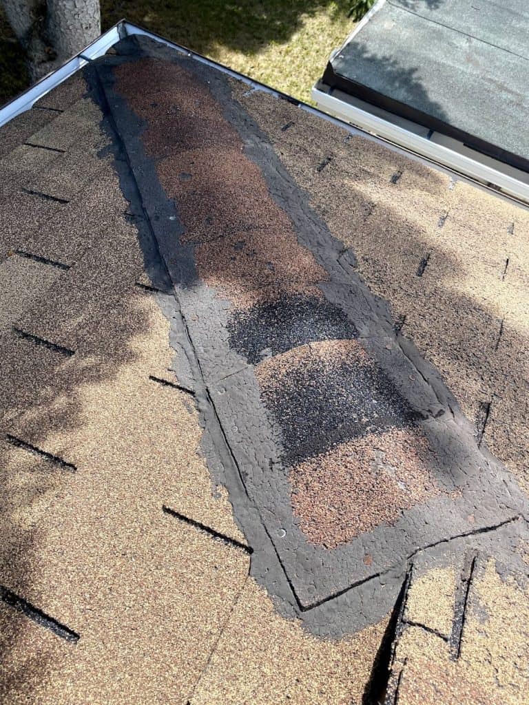 A roof repair done wrong showing improper technique